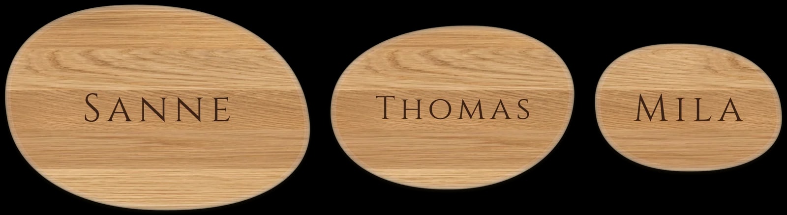 Voorbeeld uit de ontwerptool: een keienfamilie van drie eiken keien met de namen Sanne, Thomas en Mila